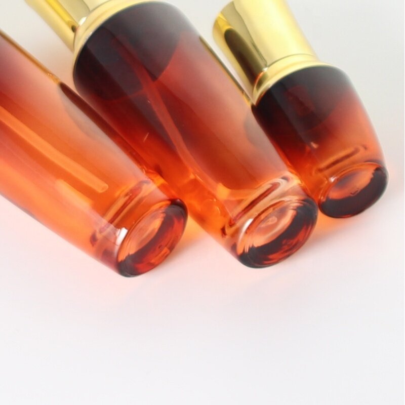 Hot 120ml special shape glass bottle for serum and lotion golden lid glass lotion  bottle amber color