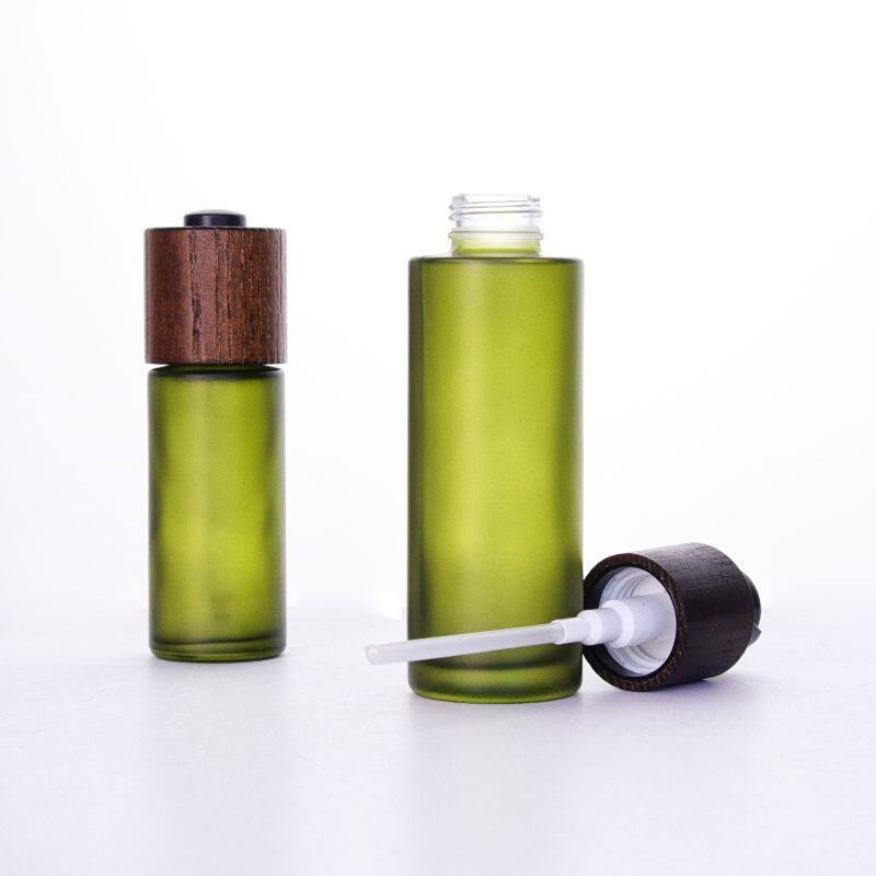 Empty hot model 30ml 50ml 60ml 100ml 120ml  flat shoulder clear frosted glass lotion bottle with bamboo pump cap