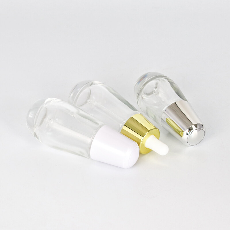 Transparent essential oil glass bottle with all kinds of pressing dropper