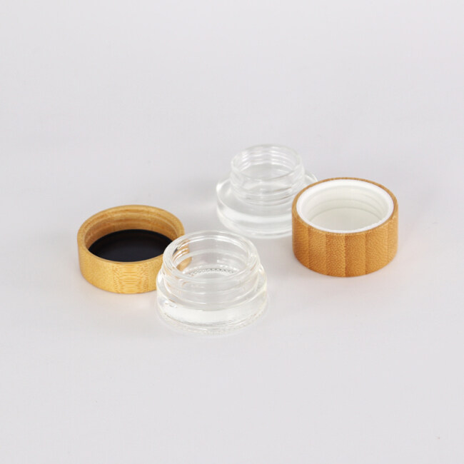 Ready to ship cosmetic plastic cylinder container face eye cream acrylic jars pot with bamboo wooden lid