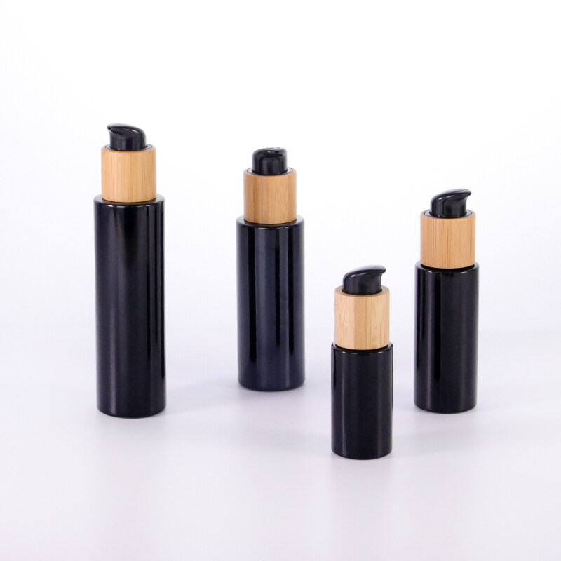 Eco-friendly cosmetic packaging cosmetic bottle opaque black bamboo pump glass bottle