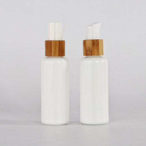 opal white glass bottle with bamboo sprayer pump