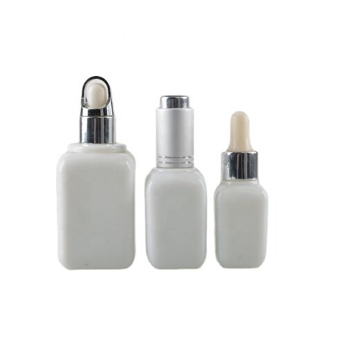 Opal white cosmetic glass essential oil bottle with aluminum top and temper evidence dropper