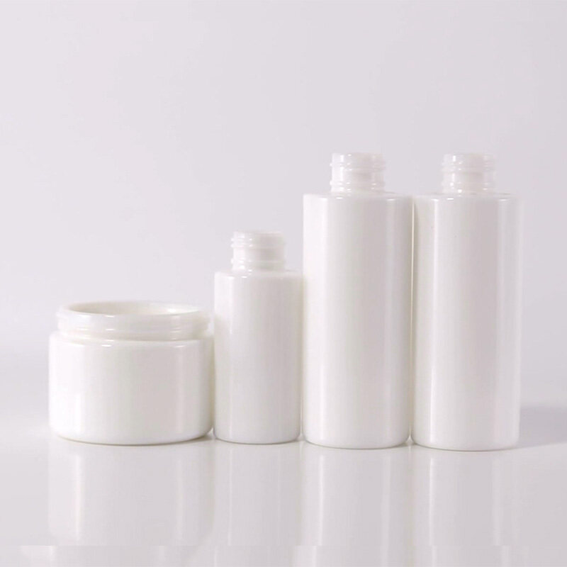 Fashionable opal white Glass Bottle Wholesale luxury cosmetic glass spray bottle packaging jars