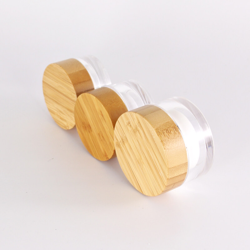 Hot Selling Environmental friendly Clear Glass Cream Jar 15g 30g 50g with Bamboo Wooden Lid  Empty Cosmetic Containers