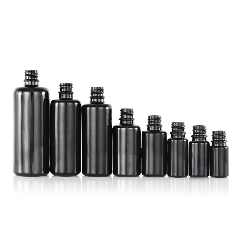 Cosmetic packaging opaque black glass bottle , good quality natural black glass bottle
