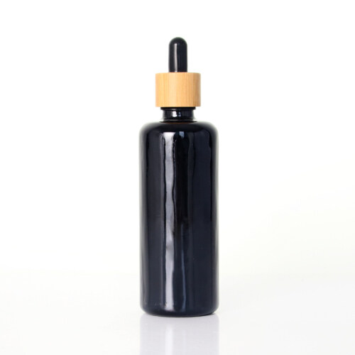 ready to ship 100ml opaque black glass bottle with bamboo dropper bottle for essential oil skin care packaging