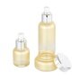 wholesale customized glass bottle set with white color plastic dispenser pump with aluminum collar