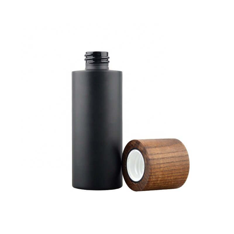 Elegant Matte black glass cosmetic bottles cream jars  with ash wooden lids for cosmetic packaging