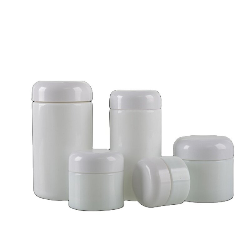 Opal white round shoulder glass bottle and jar with plastic lid for skin care