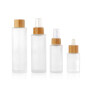 30ml 50ml 100ml 120ml clear frosted glass dropper bottle and cosmetic lotion pump sprayer bottle with bamboo lid