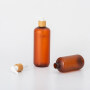 60 ml Amber color Plastic Boston Round PET Bottle with bamboo pump cosmetic packaging plastic bottle