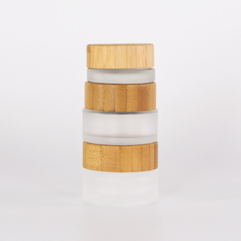 5ml 10ml 15ml 30ml 50ml 100ml 150ml 200ml clear frosted empty glass cosmetic cream jar with natural bamboo lid