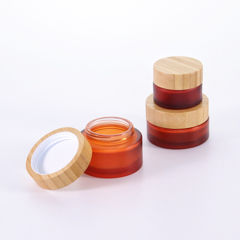 Hot sale cosmetic face cream container 5ml 15ml 30ml 50ml 100ml 150ml frosted clear glass jar with bamboo wood lid