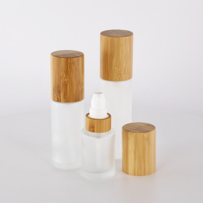 Eco friendly cosmetic packaging frosted transparent bamboo lotion pump glass bottle bamboo pump glass bottle