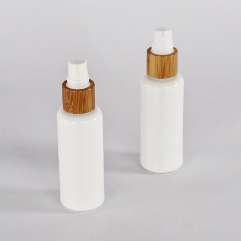 Hot seller 30ml 50ml 100ml white glass bottles bamboo collar sprayer bottle bamboo pump white glass bottle