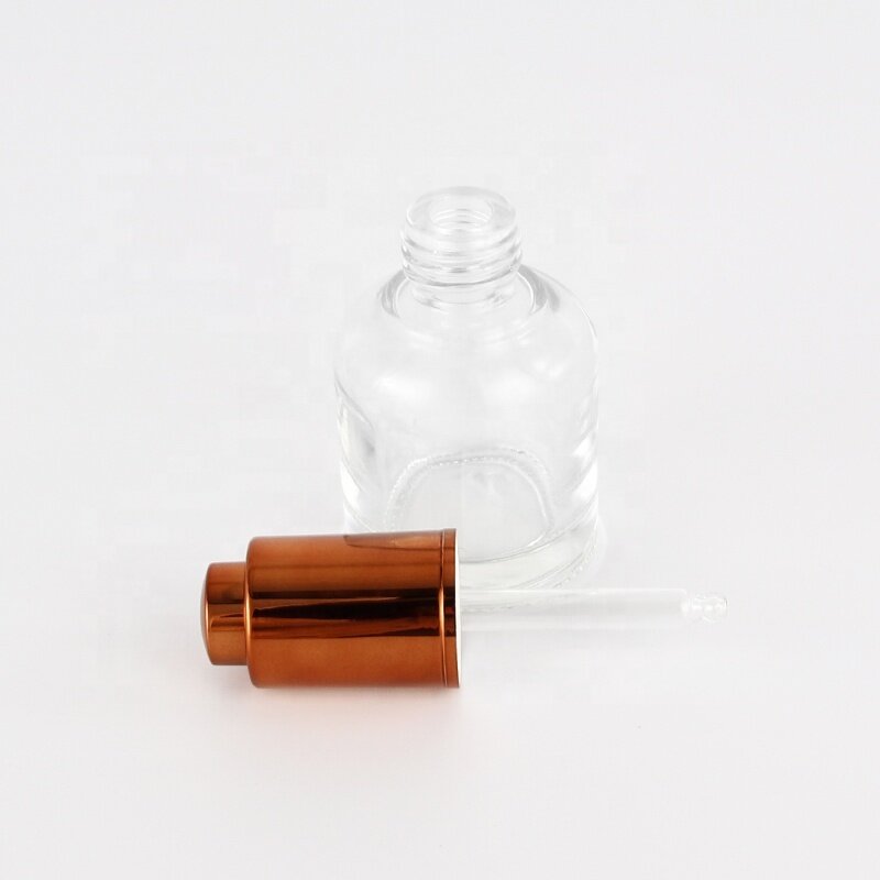 Cosmetic clear glass dropper bottle with gold dropper for cosmetic packaging glass dropper bottle