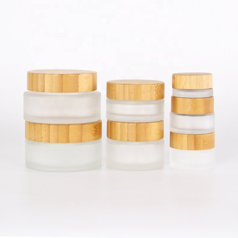 Factory Supply 5g 10g 15g 30g 50g 100g glass frosted food candy packaging clear glass cosmetic cream jar with bamboo lid