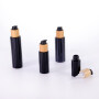 Eco-friendly cosmetic packaging cosmetic bottle opaque black bamboo pump glass bottle