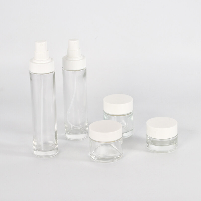 wholesale skin care packaging 60ml 30ml 20ml clear empty glass cosmetic bottle set series 30g 50g face cream jar with white lid