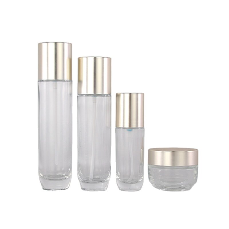 Clear cosmetic glass lotion pump bottle and cream jar