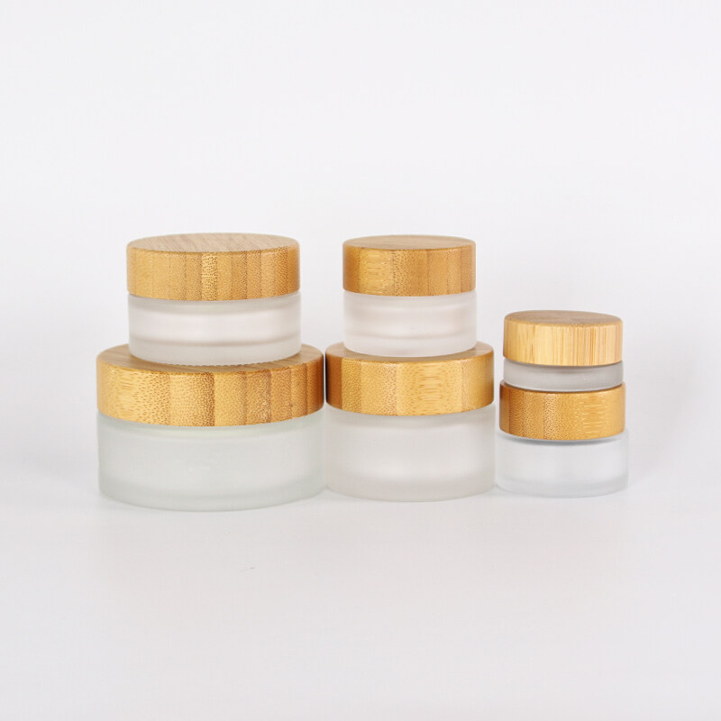 Hot sale luxury 5g 15g 30g 50g 100g 2oz 4oz bamboo cosmetic packaging frosted cream glass jars with bamboo lid