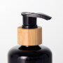 High quality 200ml opaque black glass bottle with bamboo lotion pump, lotion cosmetic glass