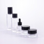 Luxury 30ml 120ml 150ml Clear Glass Bottles with frosted black plastic cap 30g 50g thick bottom glass jar for cream