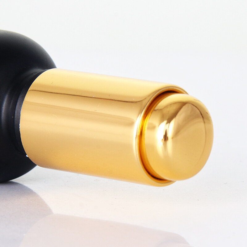 Ready to ship 30ml round shape frosted black glass bottle with luxury golden press dropper for essential oil