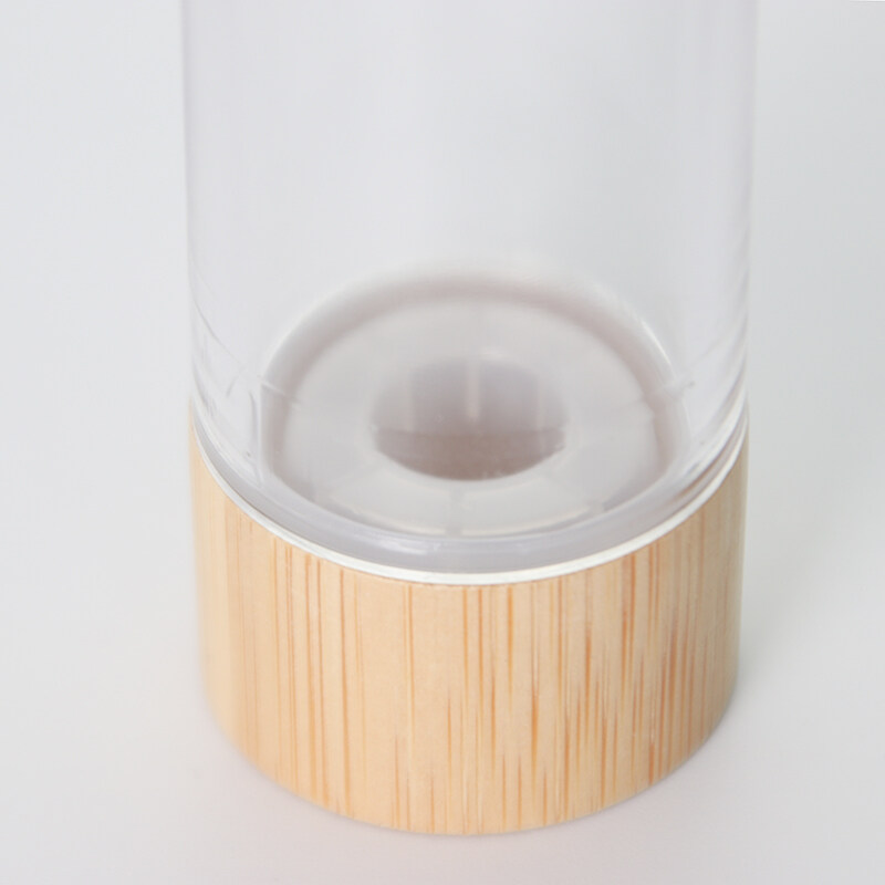 High-grade vacuum bottle bamboo wood U-shaped head press pump transparent glass bottle