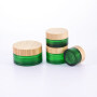 Hot sale Cosmetic Glass Jar Frosted Green 50g 100g Glass Cream Jar with Bamboo Lids