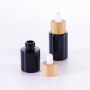 20ml 30ml 40ml round black essential oil cbd oil bottles with wooden cap cosmetic glass dropper bottles serum bottle