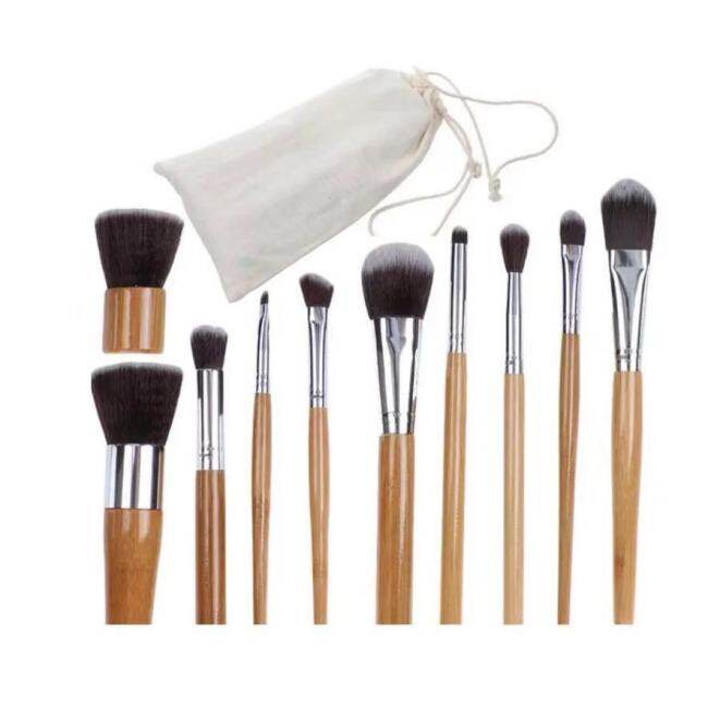 Best selling explosion models 11 bamboo handle makeup brush environmental protection wood color linen bag packaging foundation brush beauty tools