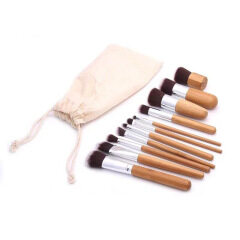 Best selling explosion models 11 bamboo handle makeup brush environmental protection wood color linen bag packaging foundation brush beauty tools