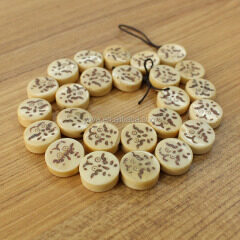 OB009 Wholesale Hand Carved Bird eye picture chess Bone round beads
