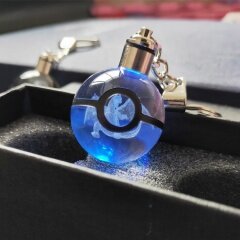 Venta al por mayor barata Led Light Pokemon Go Ball Crystal Ball Llaveros para regalos de Navidad